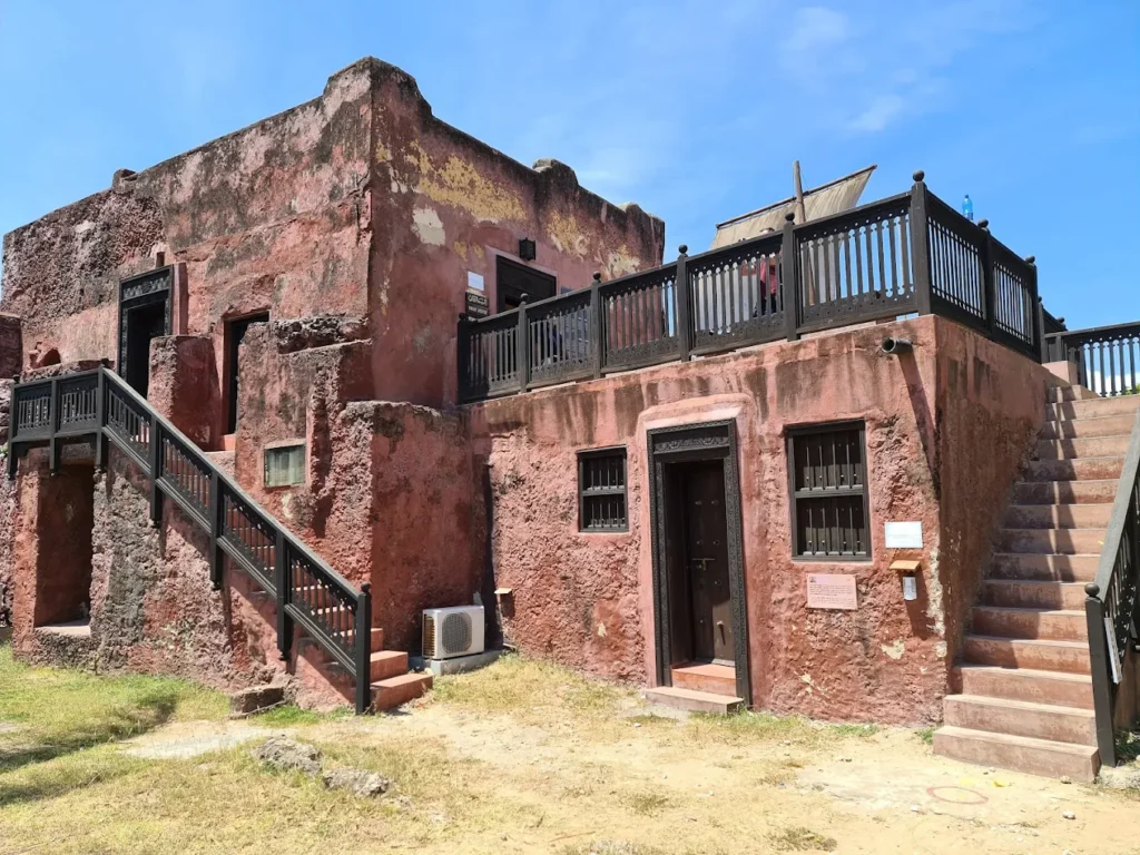 Fort Jesus Museum at sunset, highlighting the rugged coral walls and historical charm of the Kenyan coast.