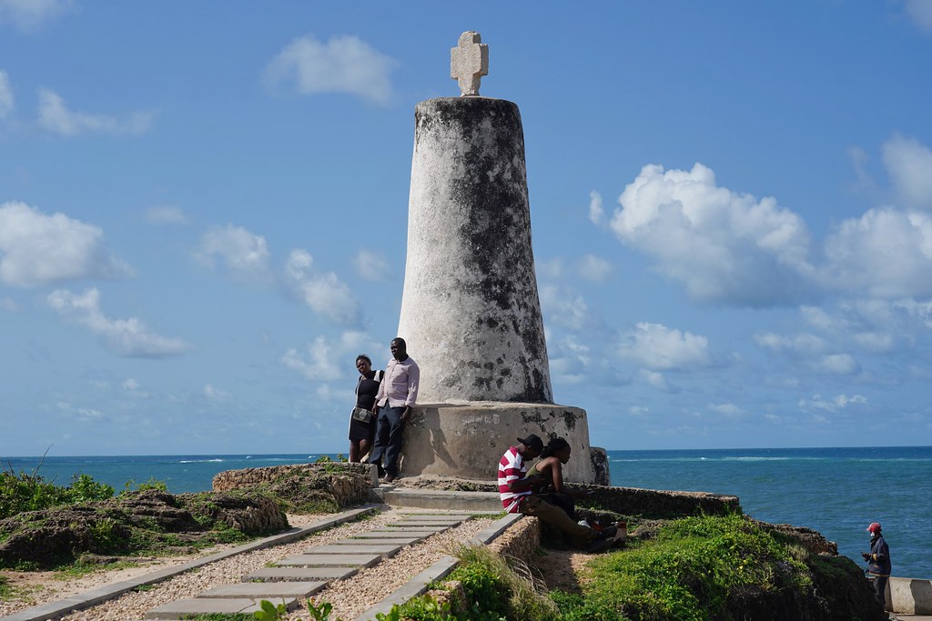 Close-up of the Padrao cross atop the Vasco da Gama Pillar in Malindi, bearing the Portuguese coat of arms.