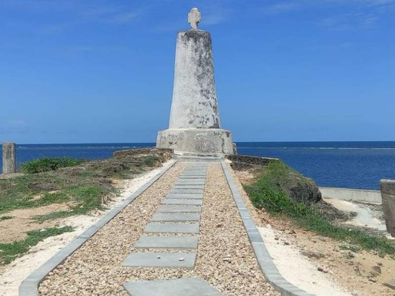Aerial view of the Vasco da Gama Pillar standing on a rocky promontory overlooking the Indian Ocean in Malindi.