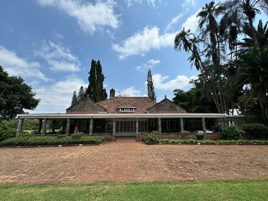 The historic Karen Blixen Museum farmhouse and gardens offer stunning views of the Ngong Hills.